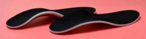Pair of foot orthotics with black covers | FootWebStar Pair of foot orthotics with black covers